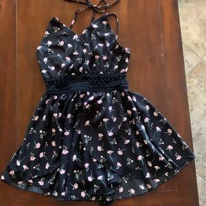 Q USA Like new size small romper. Beautiful pattern. Closet must have.